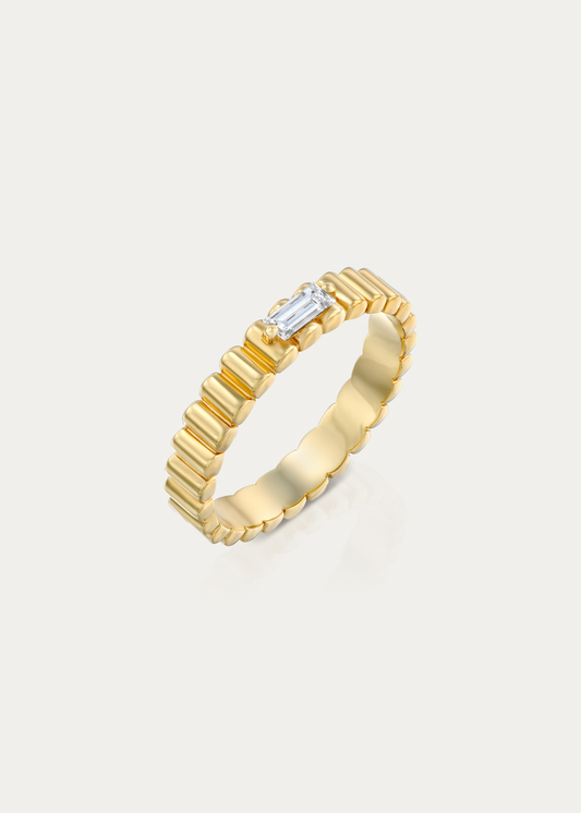 Packshot of the Bubble Shine Ring from Presiada Jewelry. Bold 3.6 mm band crafted in 14K or 18K gold with a baguette 0.13 ct diamond. Available in rose, yellow, or white gold with lab or natural diamond.