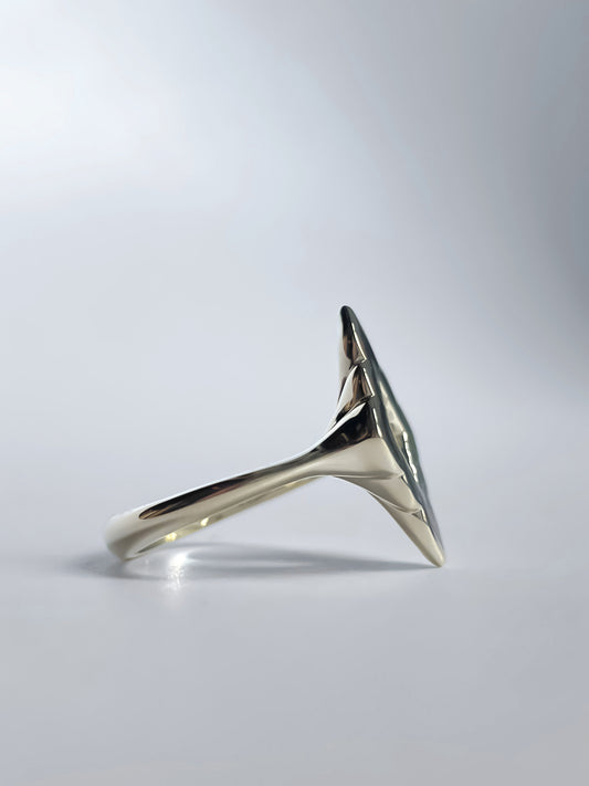 Side view of the Mirage Noir Ring, revealing its unique sculptural contours and bold design, available in 14K or 18K gold.