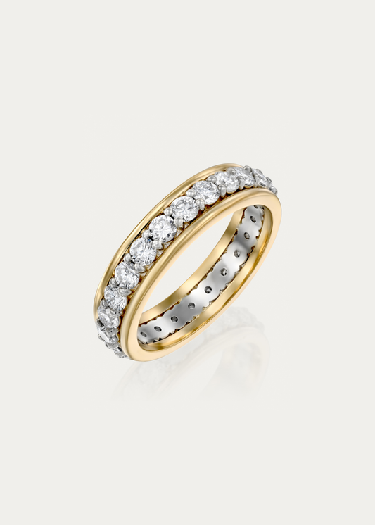 Front view of the Framed Eternity two-tone diamond ring by Presiada featuring 0.05 ct diamonds set in a framed eternity band crafted in 18K white and yellow gold.