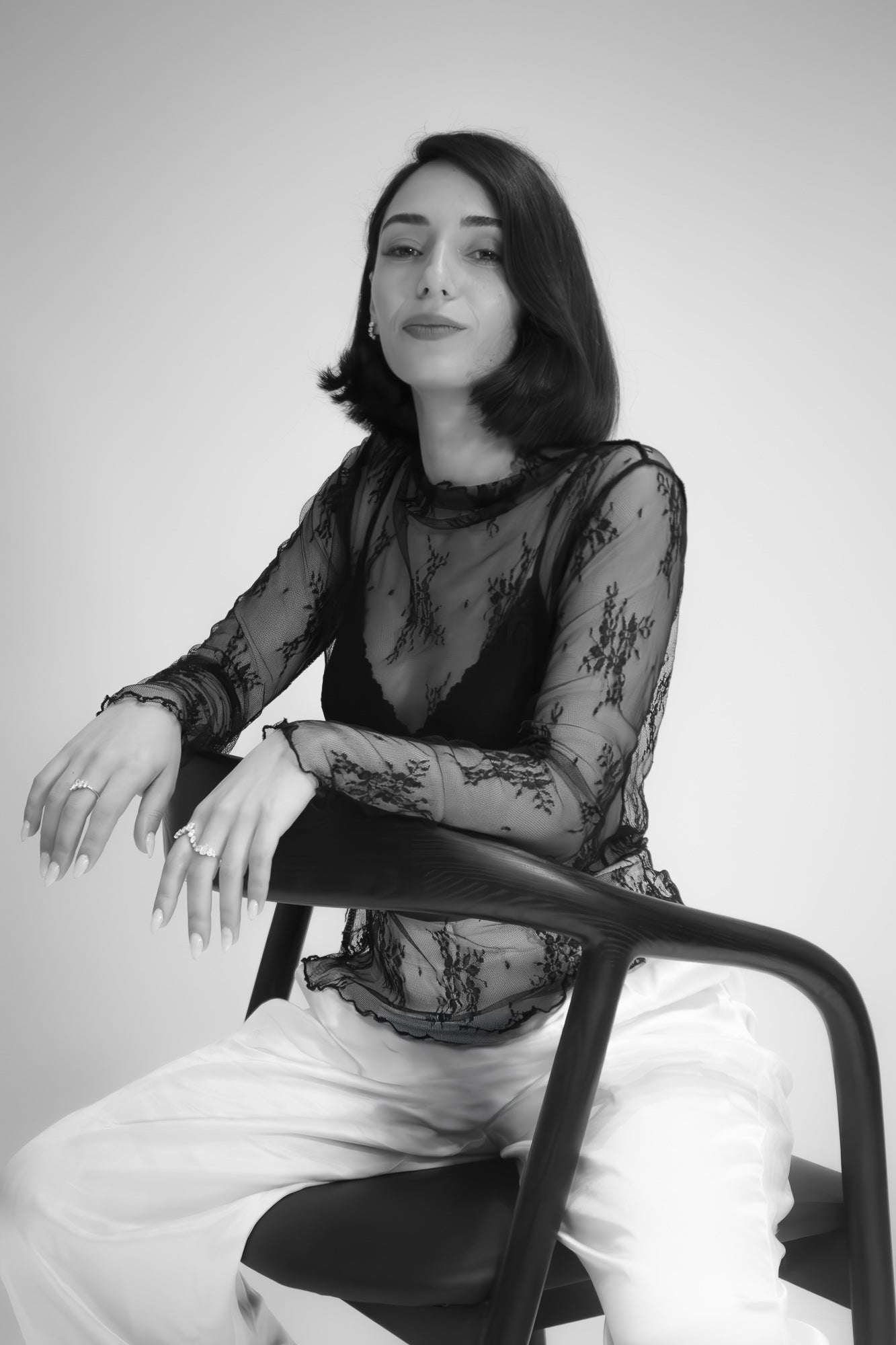 Portrait of Einav Dahan, the talented designer and founder of Presiada Jewelry Studio, known for creating exquisite handcrafted luxury jewelry with timeless elegance.