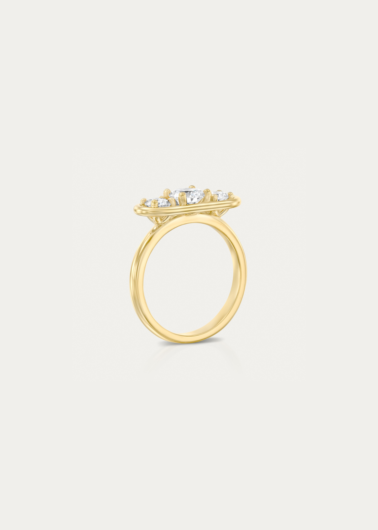 Close-up of the Élevé diamond ring with a floating frame design, featuring a 0.5 ct round diamond in 18k yellow gold