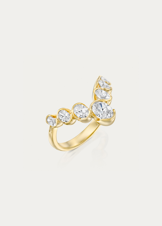 Front view of the J’ador V-Bloom Ring, an elegant V-shaped engagement ring featuring a 0.4 ct oval-cut diamond centerpiece and floral-inspired design. Handcrafted in 18k yellow or white gold by Presiada Studio, this customizable ring offers options for natural or lab-grown diamonds.